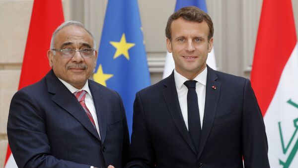 الرئيس الفرنسي إيمانويل ماكرون خلال في مؤتمر صحفي مشترك مع رئيس الوزراء العراقي، عادل عبد المهدي - سبوتنيك عربي