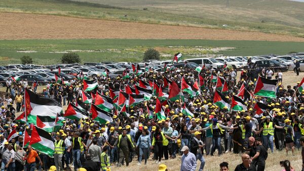 فلسطنيون يشاركون في مسيرة بمناسبة النكبة شمال إسرائيل - سبوتنيك عربي