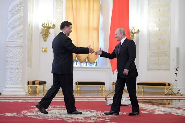 لقاء الرئيس فلاديمير بوتين مع نظيره الصيني شي جين بينغ في الكرملين، موسكو 5 يونيو/ حزيران 2019 - سبوتنيك عربي