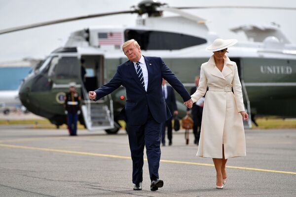 الرئيس الأمريكي دونالد ترامب وزوجته ميلانيا ترامب يصلان مطار ساوثامبتون، جنوب إنجلترا 5 يونيو/ حزيران 2019 - سبوتنيك عربي