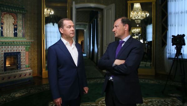رئيس الوزراء الروسي ديميتري ميدفيديف يعطي مقابلة لبرنامج أخبار يوم السبت لقناة روسيا 1، 30 مايو/ أيار 2019 - سبوتنيك عربي