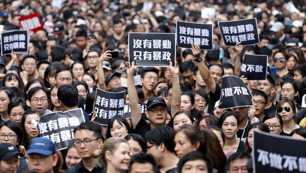 احتجاجات في هونغ كونغ ضد قانون تسليم المطلوبين إلى الصين، 16 يونيو/حزيران 2019 - سبوتنيك عربي