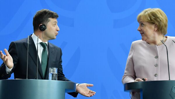 المستشارة الألمانية أنجيلا ميركل ورئيس أوكرانيا فلاديمير زيلينسكي في برلين، 18 يونيو/ حزيران 2019 - سبوتنيك عربي