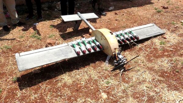 مضادات الجيش السوري تسقط طائرة مسيرة مذخرة بقنابل شديدة الانفجار شمال حماة - سبوتنيك عربي