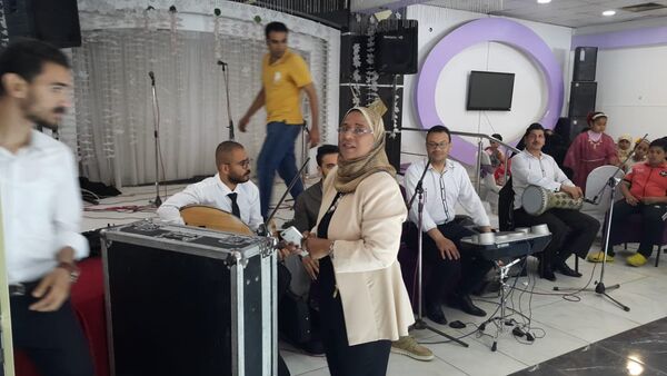 إيمان جنيدي إيمان جنيدي أول سيدة من صعيد مصر تقود فرقة موسيقية خاصة - سبوتنيك عربي