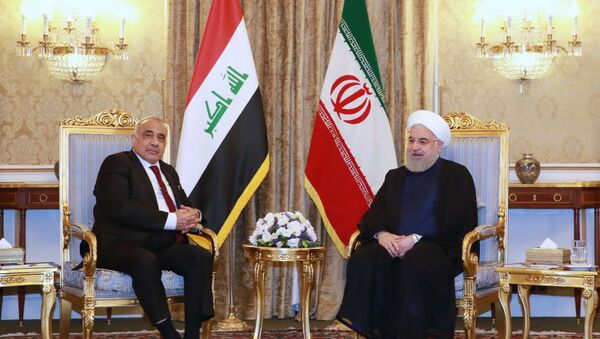 روحاني خلال استقباله لرئيس الوزراء العراقي عادل عبد المهدي - سبوتنيك عربي