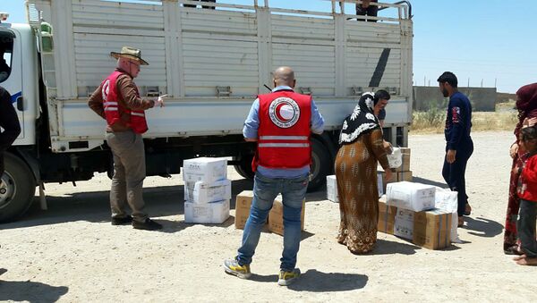 إغاثة الهلال الأحمر السوري تصل مركدة شرق الفرات - سبوتنيك عربي