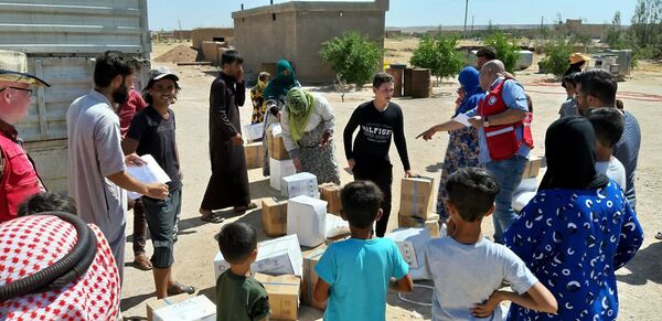 لأول مرة منذ 8 سنوات... إغاثة الهلال الأحمر السوري تصل إلى مركدة في ريف الحسكة لأول مرة منذ 8 سنوات... إغاثة الهلال الأحمر السوري تصل إلى مركدة في ريف الحسكة - سبوتنيك عربي