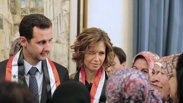 أسماء الأسد مع زوجها الرئيس السوري بشار الأسد - سبوتنيك عربي