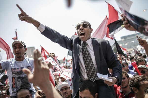 معارضو الرئيس محمد مرسي في ميدان التحرير. القاهرة، مصر 30.06.2013 - سبوتنيك عربي