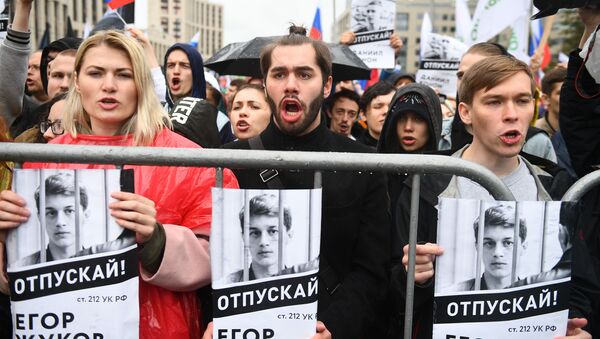 المشاركون في التجمع وسط موسكو - سبوتنيك عربي