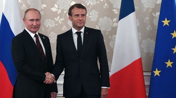 الرئيس الروسي فلاديمير بوتين والرئيس الفرنسي ايمانويل ماكرون  - سبوتنيك عربي