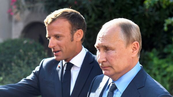 الرئيس الروسي فلاديمير بوتين والرئيس الفرنسي إيمانويل ماكرون  - سبوتنيك عربي