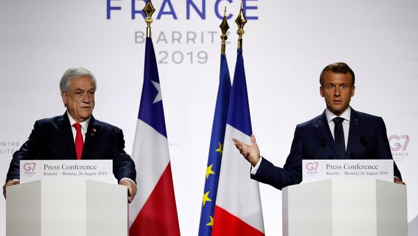 الرئيس الفرنسي إيمانويل ماكرون، في مؤتمر صحفي، مشترك مع نظيره التشيلي سباستيان بنييرا في فرنسا - سبوتنيك عربي