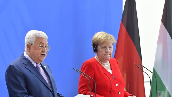 مؤتمر صحفي للمستشارة الألمانية أنجيلا ميركل والرئيس الفلسطيني محمود عباس في برلين، ألمانيا 29 أغسطس/ آب 2019 - سبوتنيك عربي