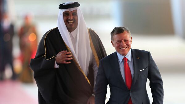 العاهل الأردني الملك عبدالله الثاني مع أمير قطر الشيخ تميم بن حمد آل ثاني، في العاصمة الأردنية عمان - سبوتنيك عربي