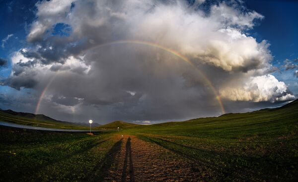 قوس قزح فوق إحدى المناطق المأهولة من أراضي منغوليا - سبوتنيك عربي