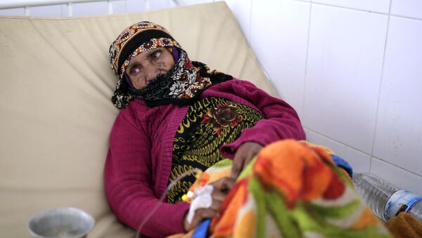 امرأة يمنية تتلقى العلاج في مستشفى بالعاصمة صنعاء - 28 مارس/آذار 2019 - سبوتنيك عربي