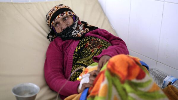 امرأة يمنية تتلقى العلاج في مستشفى بالعاصمة صنعاء - 28 مارس/آذار 2019 - سبوتنيك عربي