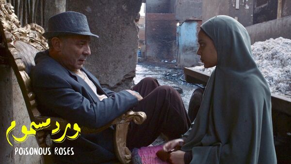مشهد من الفيلم المصري ورد مسموم - سبوتنيك عربي