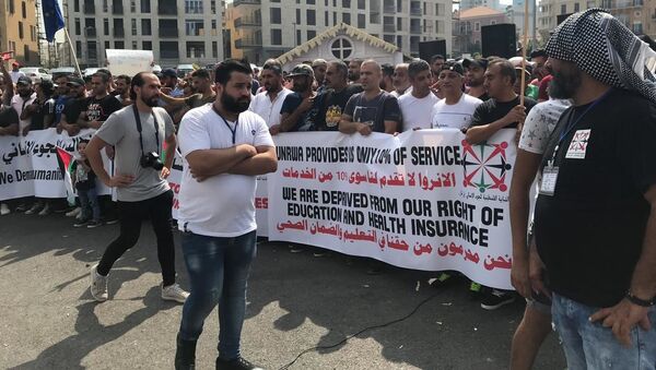 تظاهرة حاشدة للاجئين الفلسطينيين في بيروت طلباً للجوء إلى الدول الأوروبية - سبوتنيك عربي
