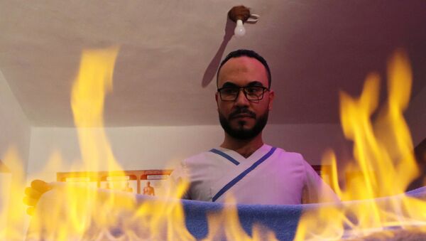 مدلك مصري يستخدم النار لتخفيف آلام العضلات - سبوتنيك عربي