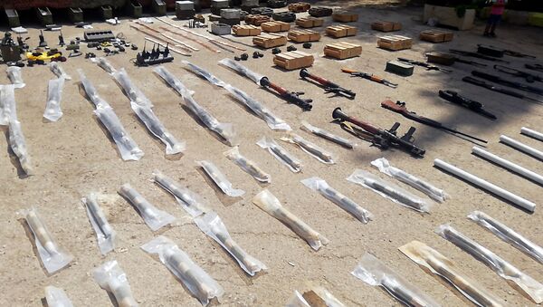 الأجهزة الأمنية السورية تضبط كمية كبيرة من الأسلحة بريف درعا - سبوتنيك عربي