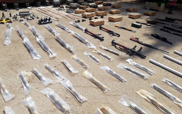 الأجهزة الأمنية السورية تضبط كمية كبيرة من الأسلحة بريف درعا - سبوتنيك عربي