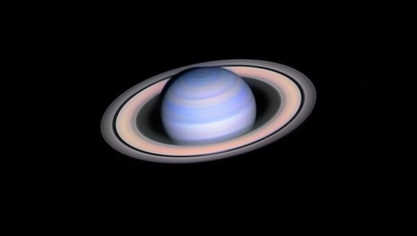 صورة زحل تحت الأشعة الحمراء (Infrared Saturn) للمصور الهنغاري لازلو فرانشيكس، المركز الأول في فئة التصوير المنظار الآلي (ROBOTIC SCOPE) - سبوتنيك عربي