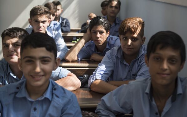 تلاميذ مدرسة الشهيد عدنان كولكي في حي برزة بدمشق، سوريا - سبوتنيك عربي