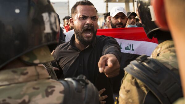بغداد تشتعل، تظارهات، مظاهرات، احتجاجت بغداد، العراق 2 أكتوبر 2019 - سبوتنيك عربي
