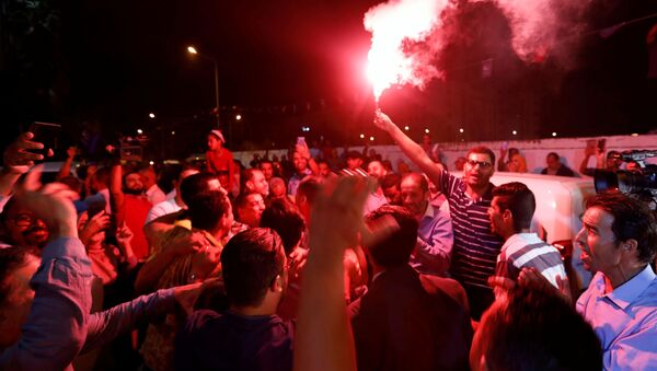أنصار حزب النهضة الإسلامي يحتفلون بنتائج الانتخابات البرلمانية في تونس العاصمة - سبوتنيك عربي