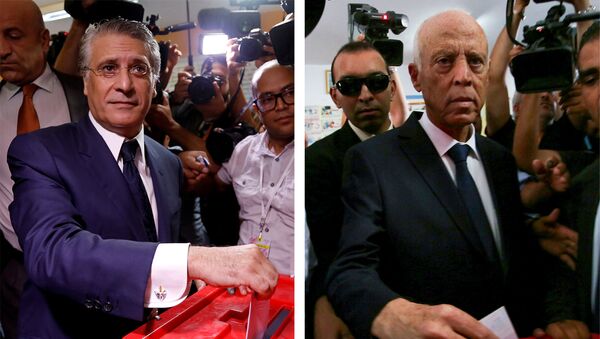 المترشحان قيس سعيد ونبيل القروي يدليان بصوتيهما في الدور الثاني للانتخابات الرئاسية التونسية - سبوتنيك عربي