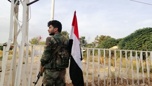 سبوتنيك تواكب رفع علم سوريا وقسد على معبر عين العرب الحدودي - سبوتنيك عربي