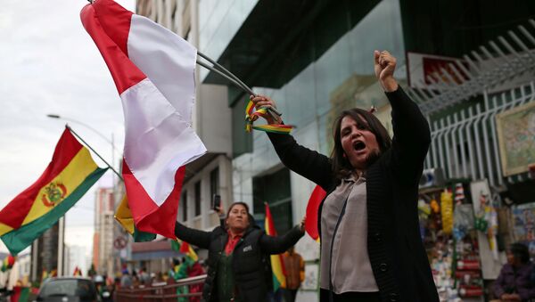 احتفالات في بوليفيا بعد أن أعلن الرئيس البوليفي إيفو موراليس استقالته  - سبوتنيك عربي