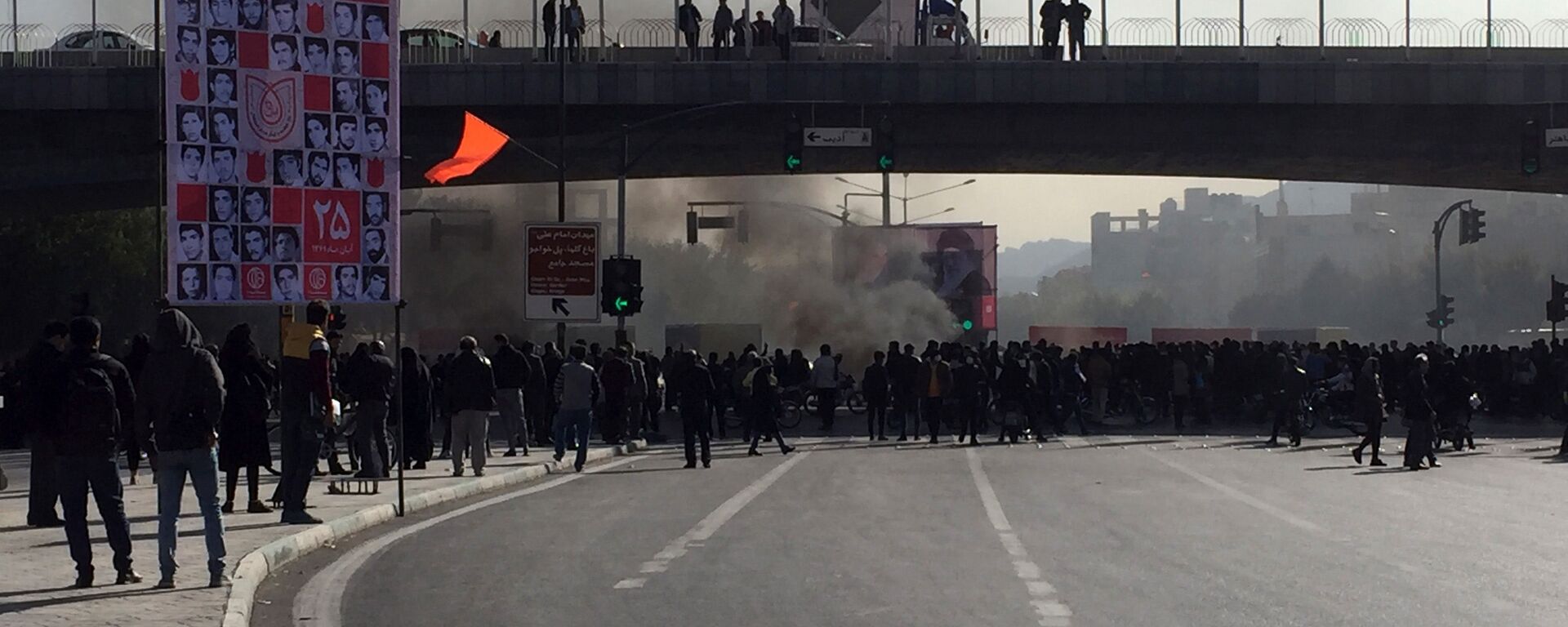 احتجاجات على رفع أسعار الوقود في  طهران، إيران 16 نوفمبر 2019 - سبوتنيك عربي, 1920, 19.05.2022