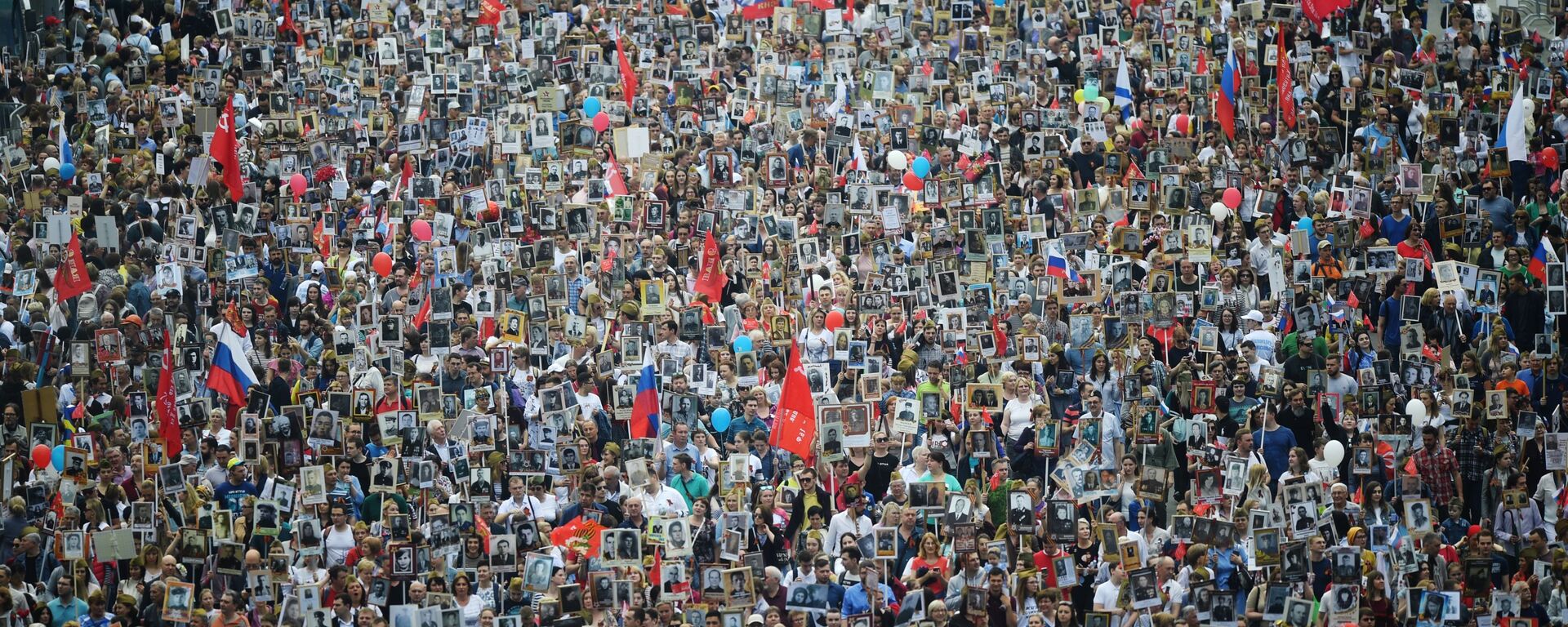 مشاركون في مسيرة الفوج الخالد في موسكو، 9 مايو 2019 - سبوتنيك عربي, 1920, 06.05.2022