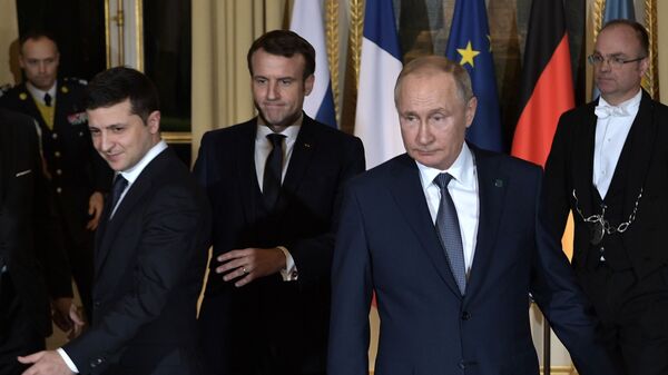 الرؤساء الروسي فلاديمير بوتين والفرنسي امانويل ماكرون والأوكراني فلاديمير زيلينسكي - سبوتنيك عربي