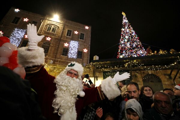 انطلاق مهرجان أعياد الميلاد ورأس السنة في البلدة القديمة في القدس، 14 ديسمبر 2019 - سبوتنيك عربي