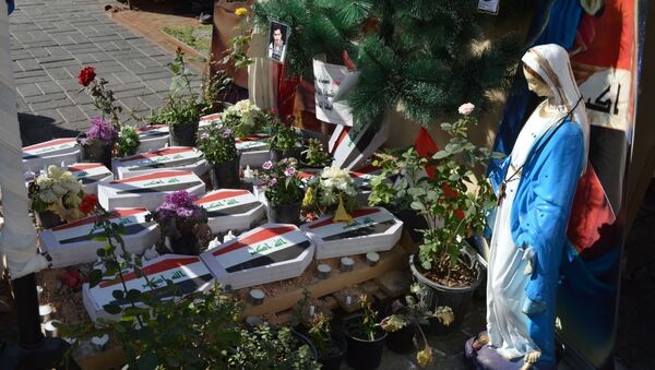   أعياد الميلاد تنبض بضحايا الثورة الشعبية في العراق - سبوتنيك عربي