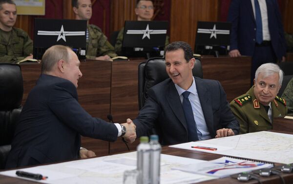 الرئيس الروسي فلاديمير بوتين والرئيس السوري بشار الأسد يحضران اجتماعًا في دمشق بسوريا - سبوتنيك عربي