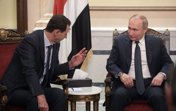 الرئيس الروسي فلاديمير بوتين والرئيس السوري بشار الأسد خلال اجتماع في دمشق - سبوتنيك عربي