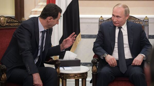 الرئيس الروسي  فلاديمير بوتين والرئيس السوري بشار الأسد خلال اللقاء في دمشق، سوريا 7 يناير 2020 - سبوتنيك عربي