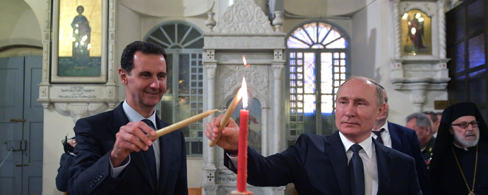 الرئيس فلاديمير بوتين والرئيس بشار الأسد يضيئان الشموع في الكنيسة المريمية‎ في دمشق، 7 يناير 2020 - سبوتنيك عربي, 1920, 25.02.2022