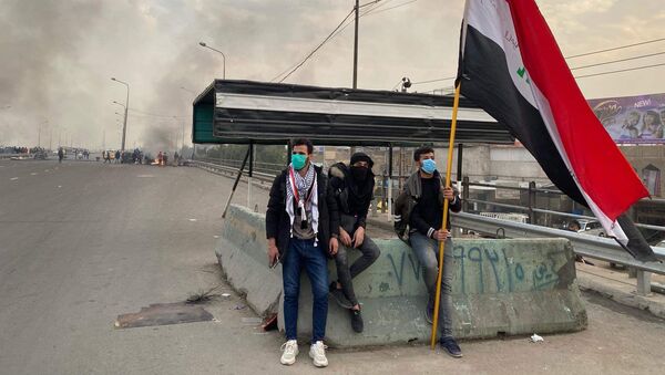 حصيلة قتلى وجرحى بين المحتجين في سريع بغداد محمد القاسم إثر الرصاص  - سبوتنيك عربي