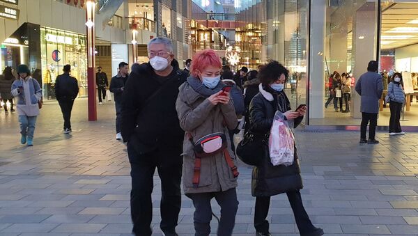 الصينيون يأخذون كافة الاحتياطات اللازمة فيما يخص انتشار فيروس كورونا الجديد، 21 يناير 2020 - سبوتنيك عربي