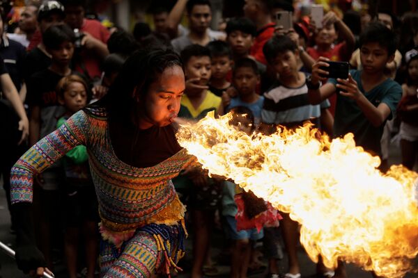 احتفالات برأس السنة الصينية الجديدة في مانيلا، الفلبين 25 يناير 2020 - سبوتنيك عربي