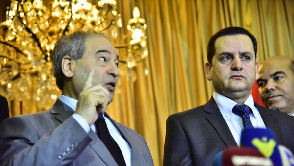 وزير خارجية الحكومة الليبية المؤقتة، عبد الهادي الحويج، في افتتاح السفارة الليبية في دمشق، سوريا - سبوتنيك عربي