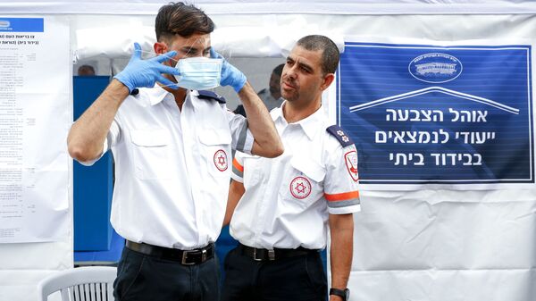مسعفون إسرائيليون في تدريب على مواجهة كورونا - إسرائيل - سبوتنيك عربي