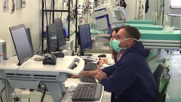 مستشفى بيرغامو الميداني،  حيث يُعالج مصابو كورونا، إيطاليا 6 أبريل 2020 - سبوتنيك عربي
